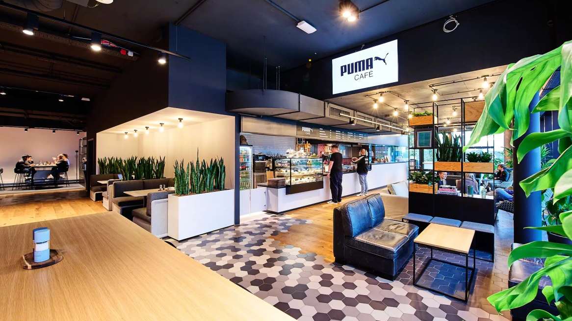 Inside the New Café at PUMA’s Global Headquarters showcasing Steelcase products