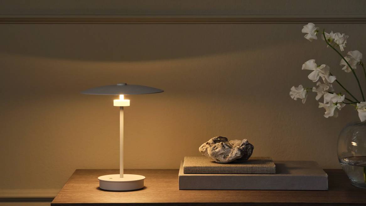 White BOLIA Reflection Lamp on a shelf