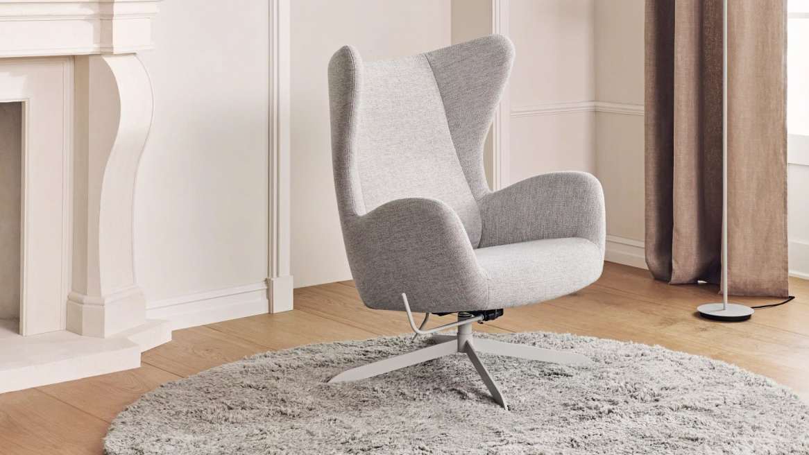 BOLIA Reflection Lamp and Solo Armchair in a lounge environment