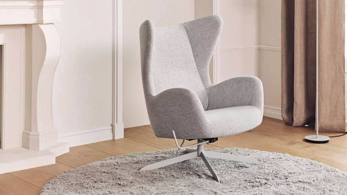 BOLIA Reflection Lamp and Solo Armchair in a lounge environment