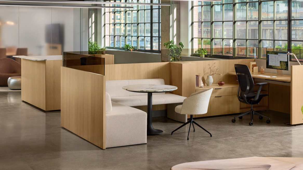 Open space in wood finishes and beige upholstery