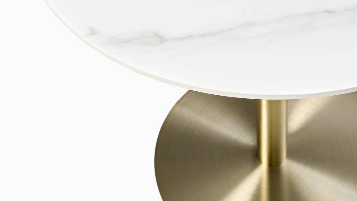 West Elm Orbit Cafe tables in white and black marble porcelain and bronze base