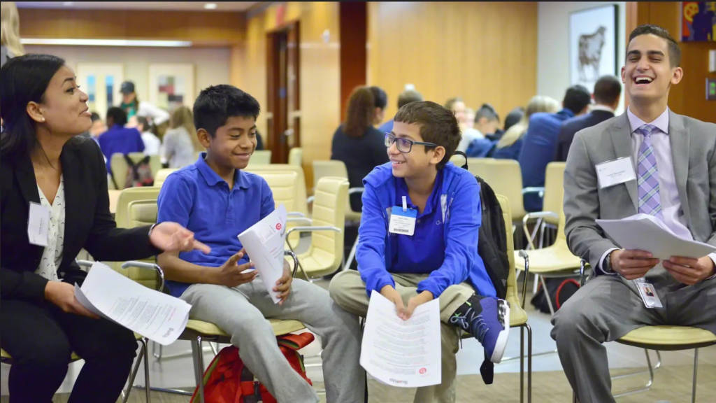 Kids and Volunteers participate in SuitUp