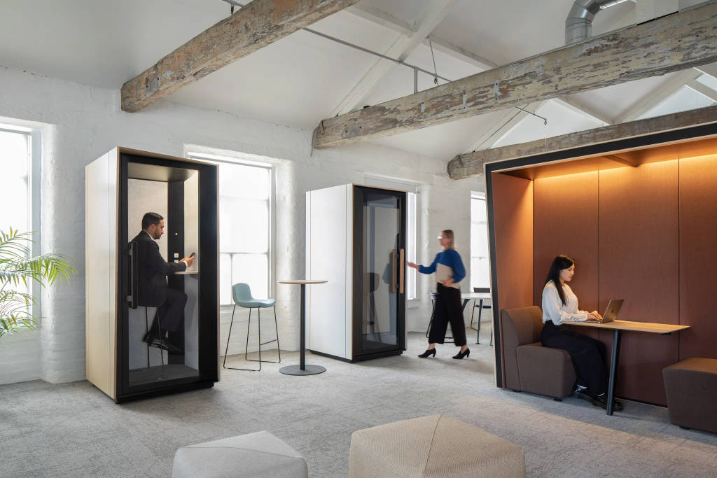 Orangebox Be my guest® phone booth in an office open space environment
