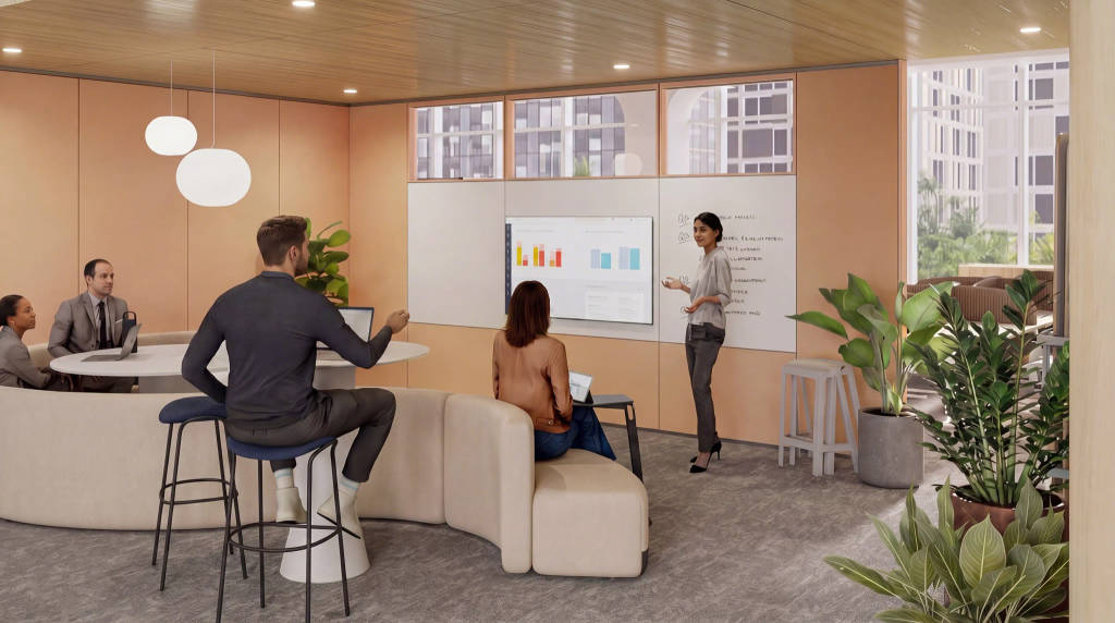 Flexible collaboration space with lounge furniture, presentation tools, and natural elements designed to foster engagement, learning, and workplace collaboration.