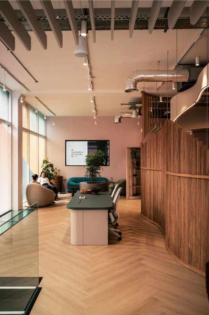 People seated in an open space environment at the London Worklife Center