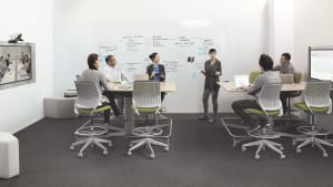 People meet in a room with cobi stool height chairs and Steelcase media:scape