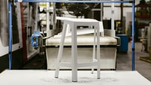 white Flex perch stool in a manufacturing plant
