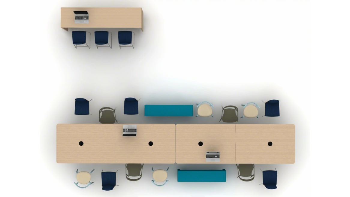 High view of a common space with a large wooden table and different types of chairs