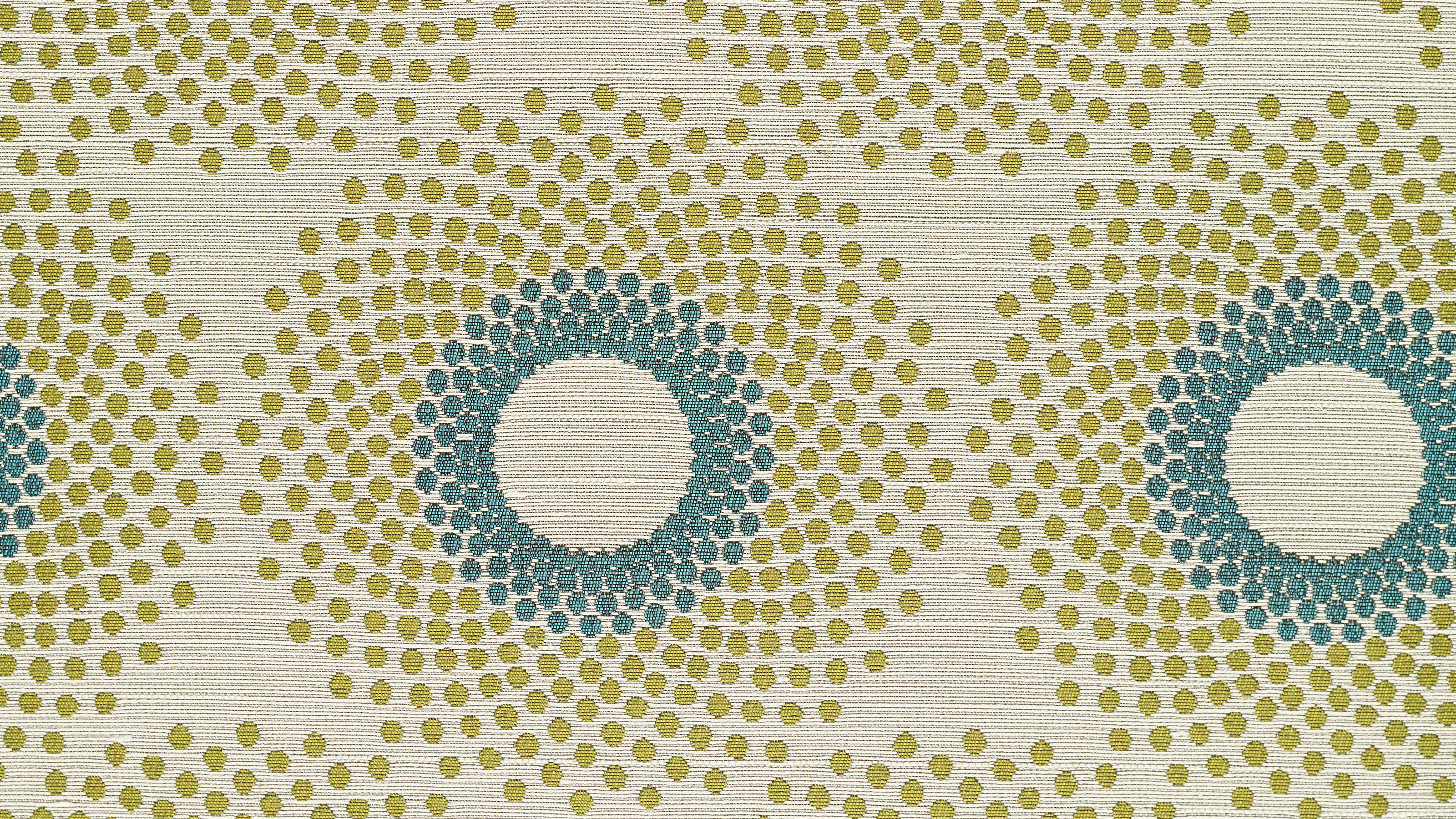 beige upholstery with green and blue dot patterns